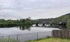 Behind The River