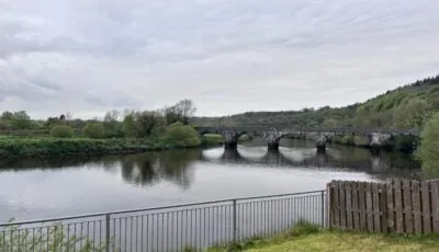 Behind The River